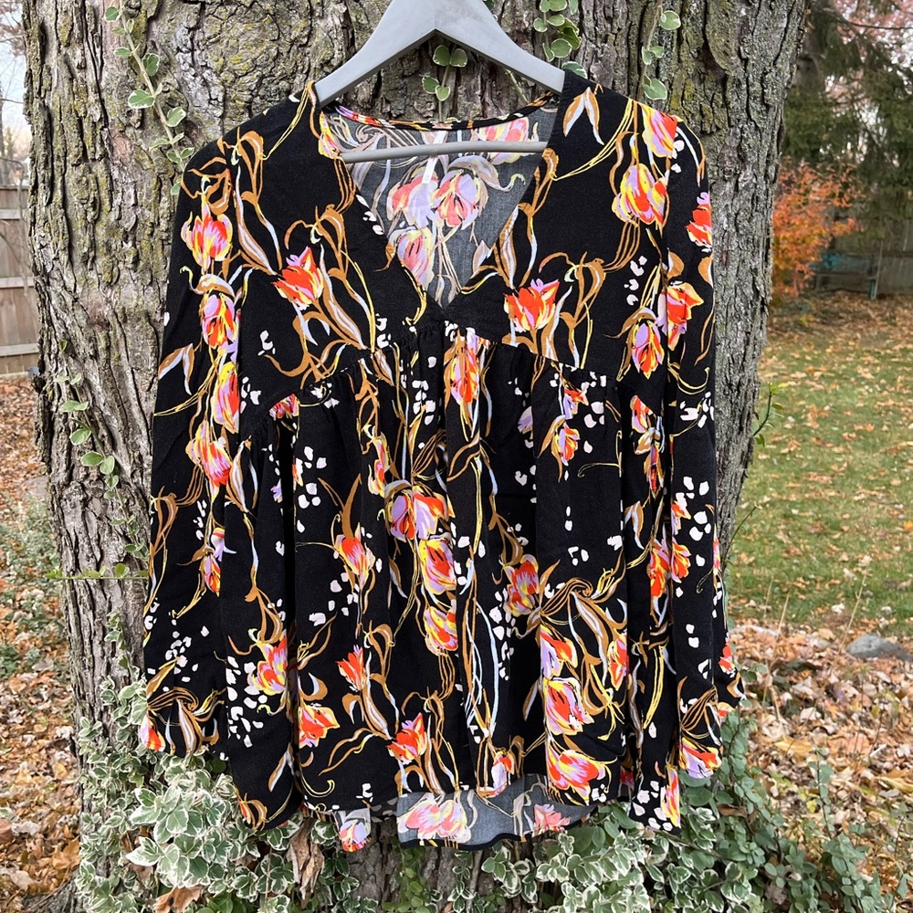 Free People Black Blouse with Vibrant Floral Design